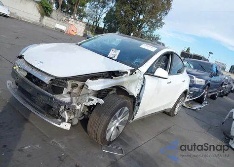 2022 Tesla Model Y Long Range Dual Motor All-Wheel Drive z USA, uszkodzony, nr VIN 7SAYGDEEXNF402355